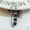 Artefato apertado na cintura muda-cintura Broche oval fixo pino anti-exposição joia pino de peito pérola fivela estilo coreano estilo coreano