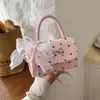 Bolsa con Estampado de Lazo para Mujer 2026 Nuevo Bolso de Hombro Cruzado de Verano Bolso de Mano Cuadrado Pequeño Coreano Venta al por Mayor