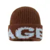 Gorro de Punto con Letra Retro Coreano de Comercio Exterior 2025 Nuevo para Mujer Invierno Cálido Holgado Versátil Protección para Orejas Gorro de Lana