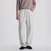 Calça casual masculina de outono, estilo vintage, corte solto, com detalhes de rebite, tecido de algodão de alta qualidade lavado e design versátil e moderno.