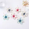 Pendientes de Flor de Aleación Retro Modernos Personalizados de Venta Caliente Europeos y Americanos con Modelos Exquisitos de Nicho de Alta Gama para Mujer