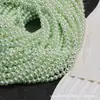 Accesorios de vestir de perlas de vidrio de alta gama de color verde fresco hechos a medida, cadenas para teléfono, collares, accesorios hechos a mano para DIY