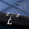 Conjunto de collar y pendientes con 26 letras en inglés, cadena de clavícula de acero inoxidable brillante que conserva el color, de estilo europeo y americano.