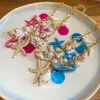 Collar Transfronterizo Europeo y Americano de Conchas y Estrellas de Mar, Cadena para Clavícula Personalizada y de Moda Estilo Vacaciones en la Playa, Joyería de Nicho con Diseño Único para Mujeres