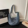 Bolso de Mezclilla Casual de Bollo Moderno y Elegante para Mujer 2026 Nuevo Primavera Versátil Simple Moda Bolso Cruzado