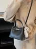 Bolsas Retro de Nicho de Alto Padrão Transfronteiriças para Mulheres Nova Coleção Primavera 2026 Versátil Casual Bolsa Transversal Bolsa de Mão Bolsa Saco