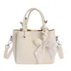 Bolso Cubo Versátil de Nicho Súper Popular Estilo Coreano Nuevo Modelo Verano 2026 para Mujer, Bolso de Hombro Cruzado Simple y Elegante
