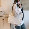 A popular bolsa de ombro transparente com laço de fita 2025, linda e grande capacidade de costura, da moda deste ano
