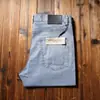 Estación europea verano fino importado mezclilla microelástico sarga transpirable ultradelgado Tencel jeans rectos ajustados para hombre