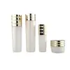 Set de botellas redondas de vidrio triangular en stock 38-150ml para agua, loción y esencia, botella vacía de 60g para crema facial, materiales de embalaje