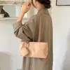 Bolsa de camurça simples de grande capacidade para mulheres, nova bolsa de ombro vintage para o outono e inverno de 2026, bolsa de mão tote