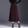 Falda de Cachemira Elástica en la Cintura Línea A para Mujer 2026 Otoño/Invierno Nueva Cintura Alta que Cubre la Cadera Longitud Media Elegante Falda de Dobladillo Ancho