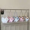 Bolso tote de gran capacidad para el día a día con estampado de colores contrastantes, bolso tote de viaje transfronterizo, bolso cubo de alta gama para mujer