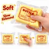 Brinquedo de apertar em formato de bastão de manteiga para alívio do estresse, gadget para aliviar o estresse de estudantes, bastão de manteiga macio e fofo de espuma PU com retorno lento