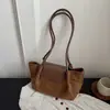 Bolso de hombro retro de gamuza transfronterizo para mujer, nuevo estilo 2026, de alta gama, moderno, versátil, gran capacidad, bolso de axila con estampado de leopardo
