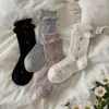 Boca de burbuja capullo de flor lazo flor pequeña calcetines mujer primavera otoño sin costuras calcetines de media pantorrilla ins de moda estilo japonés calcetines holgados moda