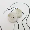 Botones de resina de imitación de cuerno de fábrica directos botón redondo de cuatro ojales botones para abrigo cortavientos al por mayor