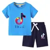 Camiseta para Niños 2026 Verano Nuevo Comercio Exterior Ropa para Niños Ins Estilo Coreano Algodón Manga Corta y Pantalones Cortos para Niños Conjunto de Dos Piezas