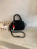 Bolso Cuadrado Pequeño de Diseño de Nicho para Mujer 2026 Nuevo Moderno Elegante Bolso de Bowling de Moda Versátil Bolso de Hombro de Gama Alta