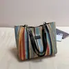Bolsa de mano de gran capacidad, bolsa de paja para vacaciones, nueva bolsa de hombro de nicho para el día a día, moderna bolsa de playa de verano para mujer