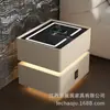 Mesa de noche flotante de lujo ligero con luz sensor, carga inalámbrica, cerradura de contraseña multifunción, mueble de almacenamiento para dormitorio principal de celebridad de internet, estilo nuevo