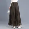 Falda de malla de hadas adelgazante y rejuvenecedora para mujer, nuevo estilo otoño 2026, temperamento suave y dulce, falda de longitud media moderna para mujer