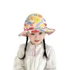 Sombrero de pescador para bebé al por mayor moda estampado pequeño fresco sombrero para el sol dos lados disponibles sombrero para niños versión coreana