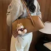 Bolsa de lichia para o dia a dia, novo modelo de outono, acessório de ombro, estilo cartoon nicho coreano, bolsa de mão feminina, 2026, grande capacidade, bolsa de ombro