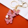 Chaveiro de Carro Borboleta Strass Pérola Pingente de Bolsa Feminina Chaveiro Metal Diamante Pendurado Presente Criativo
