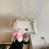 Bolso cuadrado pequeño para mujer, nuevo modelo primavera 2026, bolso de mano para mujer con patrón de lichi, bolso cruzado, bolso de hombro versátil para el día a día para mujer