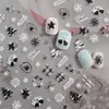 Pegatinas de arte para uñas Redanco5D en relieve, con un diseño de gran venta con detalles de lámina dorada, motivos de árbol de Navidad, copo de nieve y guante. Dr2018