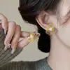 Pendientes Metálicos Huecos de Flor de Lujo de Gama Alta, Nuevos Pendientes Populares de Diseño de Nicho para Mujer, Elegantes y con Estilo Accesorios para Orejas