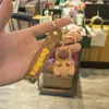 Llavero de capibara lindo muñeco pequeño de capibara colgante para coche mochila llavero agarra regalo pequeño al por mayor