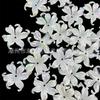 ABS blanco agujero recto flor de iris material de cuentas diy perla de imitación color mágico agujero pasante seis pétalos de hoja cuentas sueltas venta al por mayor
