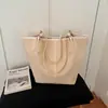 Bolso de hombro, bolso de mano, bolso tote de gran capacidad, versátil, de moda, elegante, tejido, estilo coreano, 26 novedades europeas y americanas