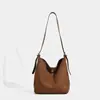 Bolsa Saco de Camurça para o Dia a Dia Feminina Primavera e Outono 2026 Bolsa Tote Grande de Ombro Transversal com Toque de Luxo e Design Exclusivo