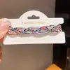 Pulsera tejida multicapa con incrustaciones de diamantes de estilo francés de lujo ligero con un diseño único, pulsera de nicho con una sensación de lujo ligero y alta gama, accesorio de mano versátil para mujer