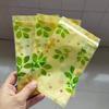 Bolsa de hueso de flor tricolor bolsa de embalaje de alimentos de oliva té perfumado fruta seca bolsa sellada fondo plano autosellable bolsa de plástico