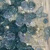 2023 nuevo cielo estrellado hielo a través del mar azul degradado Diy hecho a mano Sp periférico Valle belleza amor diseño de frijol con agujeros en stock