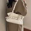 Nova bolsa de ombro feminina estilo coreano, moda de nicho, bolsa de axila de grande capacidade, bolsa tote versátil de alta qualidade para o dia a dia