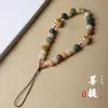 Cadena Colgante para Teléfono Móvil Bodhi con Diseño de Garra de Gato y Flor de Loto Colgante Corto para Hombres y Mujeres Cordón Anti-pérdida Colgante de Muñeca para Funda de Teléfono Móvil