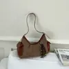 Bolso bandolera de hombro moderno 2026 nuevo modelo bolsa tote de gran capacidad para debajo del brazo moda para ir al trabajo bolso tejido