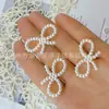 Abs Blanco Crudo Perla de Imitación Calado Lazo Grande Cuentas Sueltas Uñas Artísticas DIY Caja de Juguetes Funda de Teléfono Móvil Parche Decorativo Mayoreo