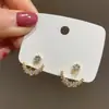 Pendientes colgantes de estrella y luna de diamante brillante para mujer, estilo Ins personalizado, diseño de nicho de lujo accesible, unos pendientes de doble uso