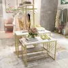 Tienda de ropa de venta directa de fábrica Exhibidor de piso a piso Estante de doble hilera Nakajima Mesa de agua dorada Mesa de exhibición de zapatos y bolsas