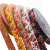 La nueva banda elástica jacquard con borde de gancho en forma de rosa, impresión, 5000 metros, material de poliéster, ropa colorida