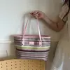 Bolso de paja tejido para mujer 2026 nuevo bolso de mano estilo playa de verano, bolso de hombro simple y versátil para vacaciones