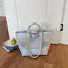Bolsa Tote de Moda Feminina Nova Outono 2026 Transfronteiriça Portátil Grande Capacidade Armazenamento para Viagem ao Ar Livre Bolsa de Mão Bolsa de Ombro