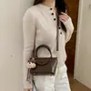 Novedad Primavera 2026 Bolso Cubo Plateado para Mujer Moda para Ir al Trabajo Bolso de Mano Versátil Textura Plisada Bolso de Hombro Único Cruzado