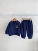 Roupas de bebê 2023 lapela suéter terno calças compridas primavera e outono homens e mulheres bebê estilo ocidental urso duas peças terno moda